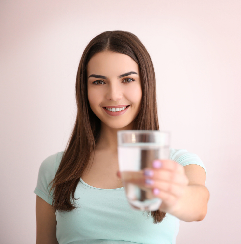 Beautiful Girl Drinking Water